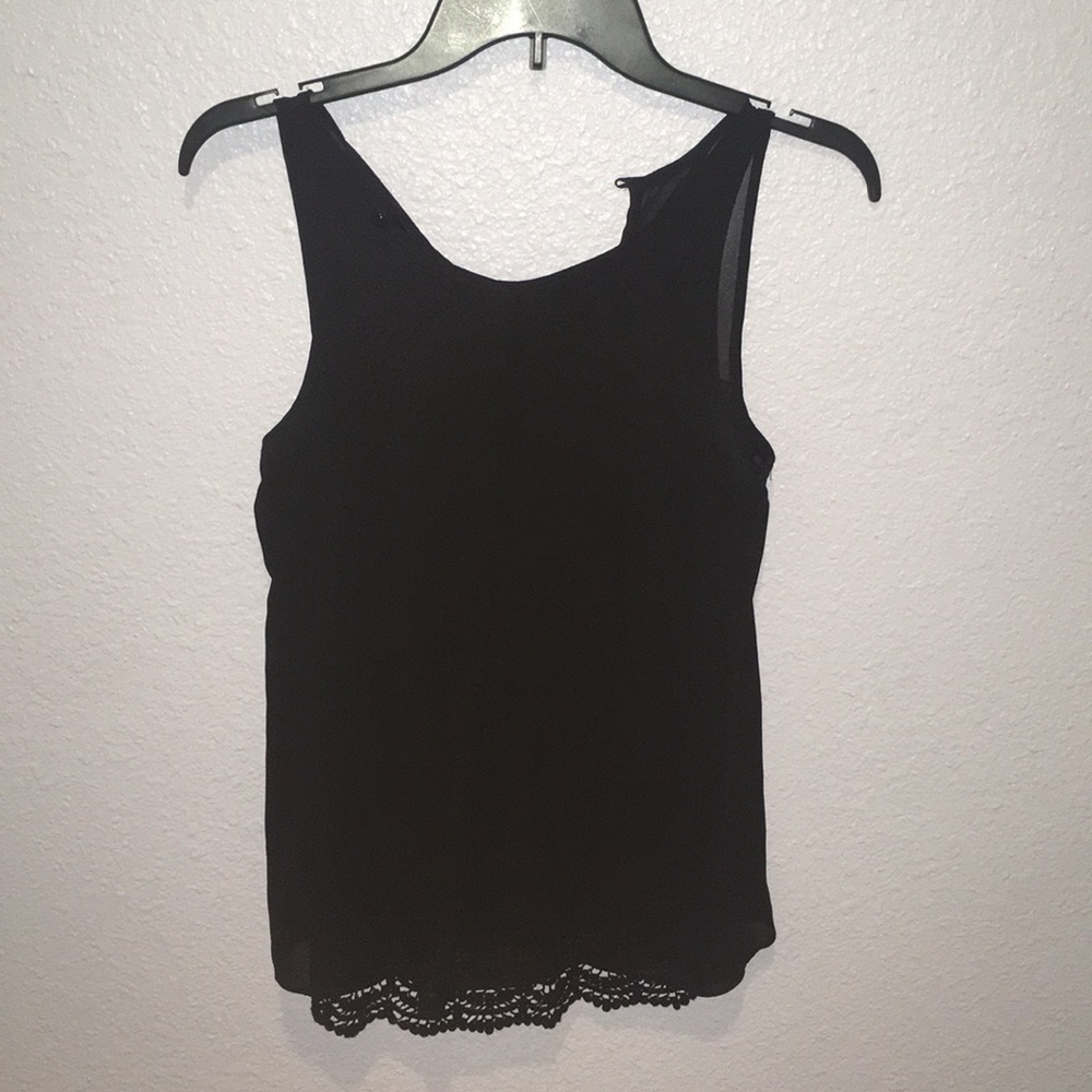 Sleeveless black blouse